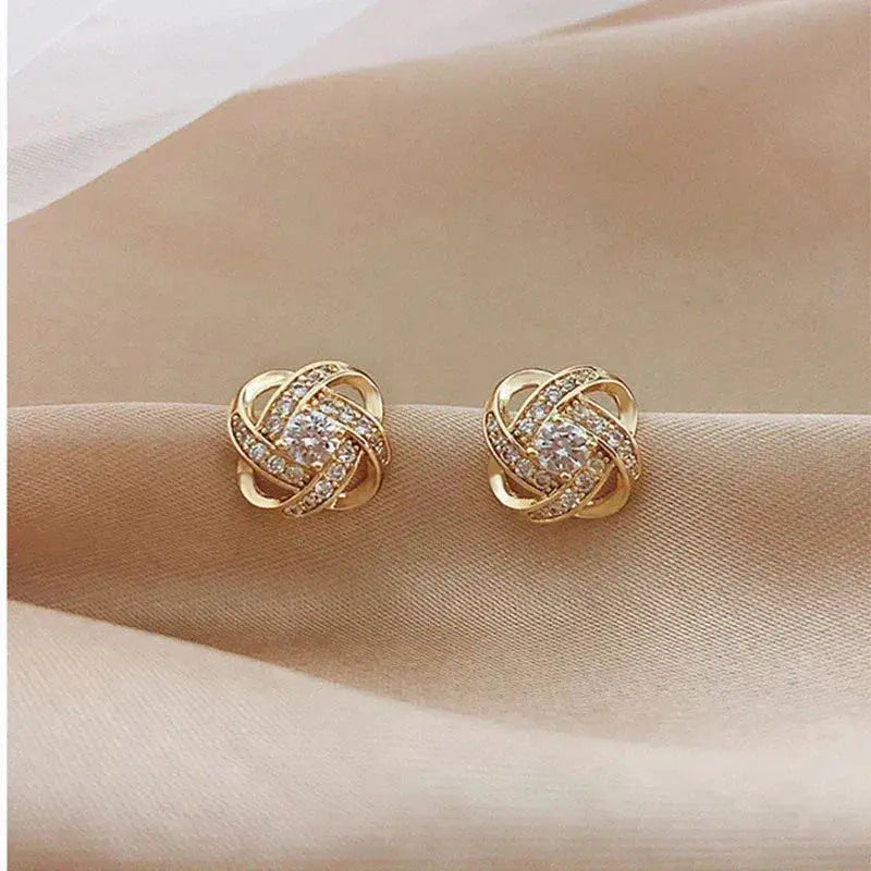 1+1 Offer: Flower Spiral Cross Earrings