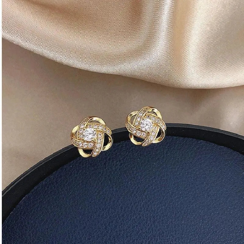 1+1 Offer: Flower Spiral Cross Earrings