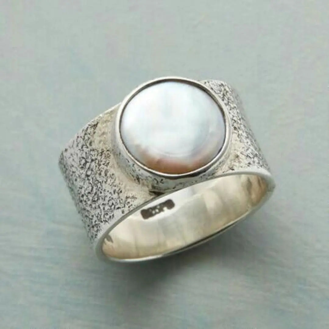 Anillo vintage de plata con perla blanca