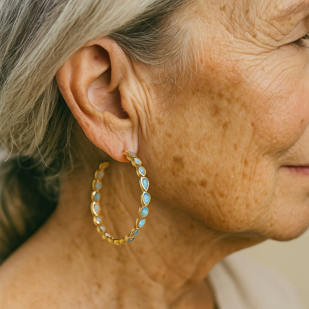 Złote kolczyki Vintage z niebieskim opalem