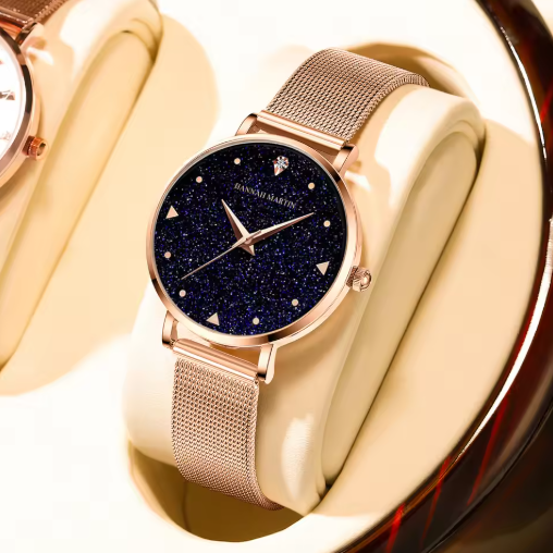 Hannah Martin růžově zlaté hodinky s kovovým páskem a diamantovými detaily