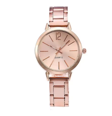 Reloj minimalista elegante en tono dorado y acero inoxidable