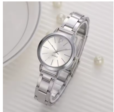 Reloj minimalista elegante en tono dorado y acero inoxidable