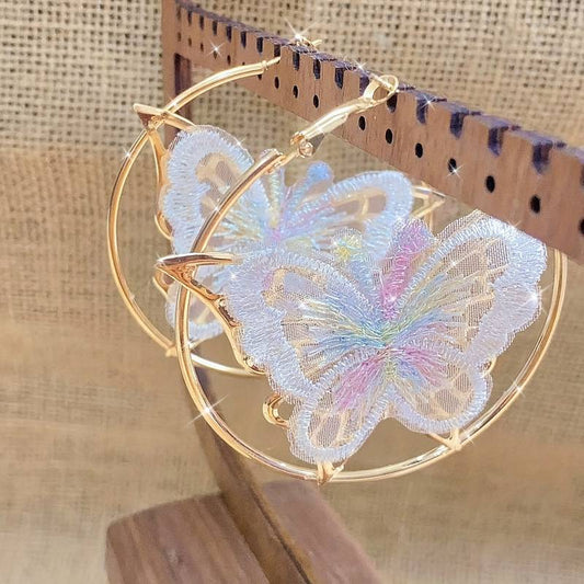 Pendientes de aro vintage con mariposa blanca