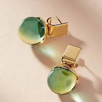 Pendientes vintage con cristal verde en oro.