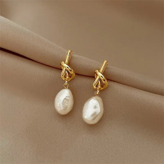 Oferta 1+1: Pendientes elegantes de perla barroca en oro