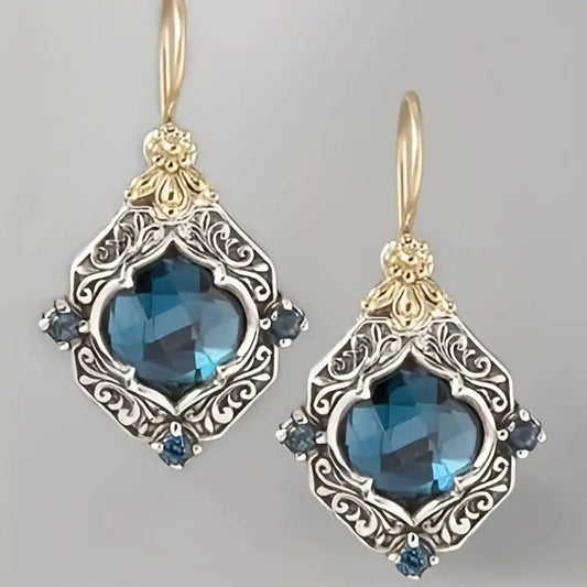 Oferta 1+1: Pendientes de cristal azul en oro y plata