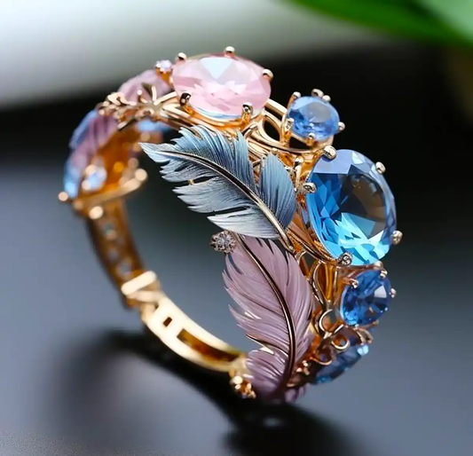 Oferta 1+1: Anillo Vintage Exótico de Pluma con Cristal