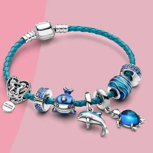 Pulsera estilo océano + charms incluidos en cuero y plata