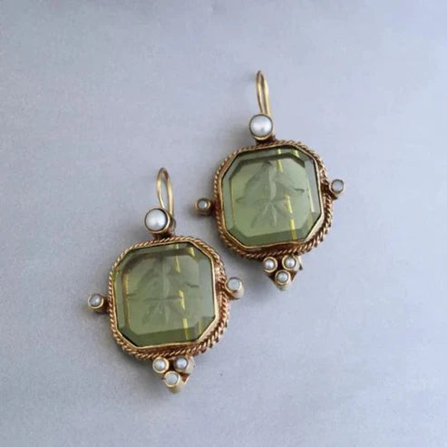 Pendientes vintage de cristal verde.