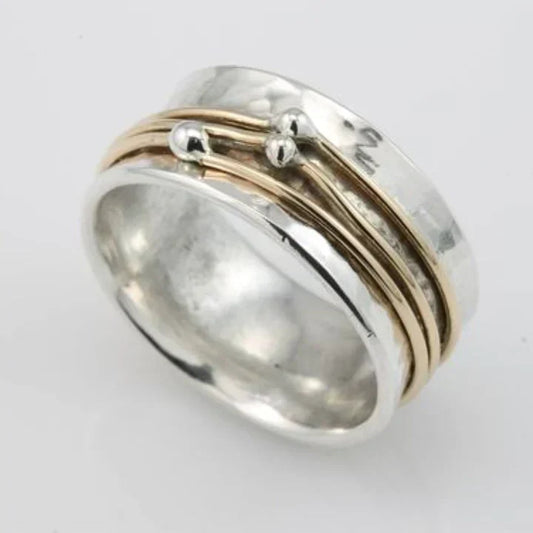 Layered silver ring with gold elements
