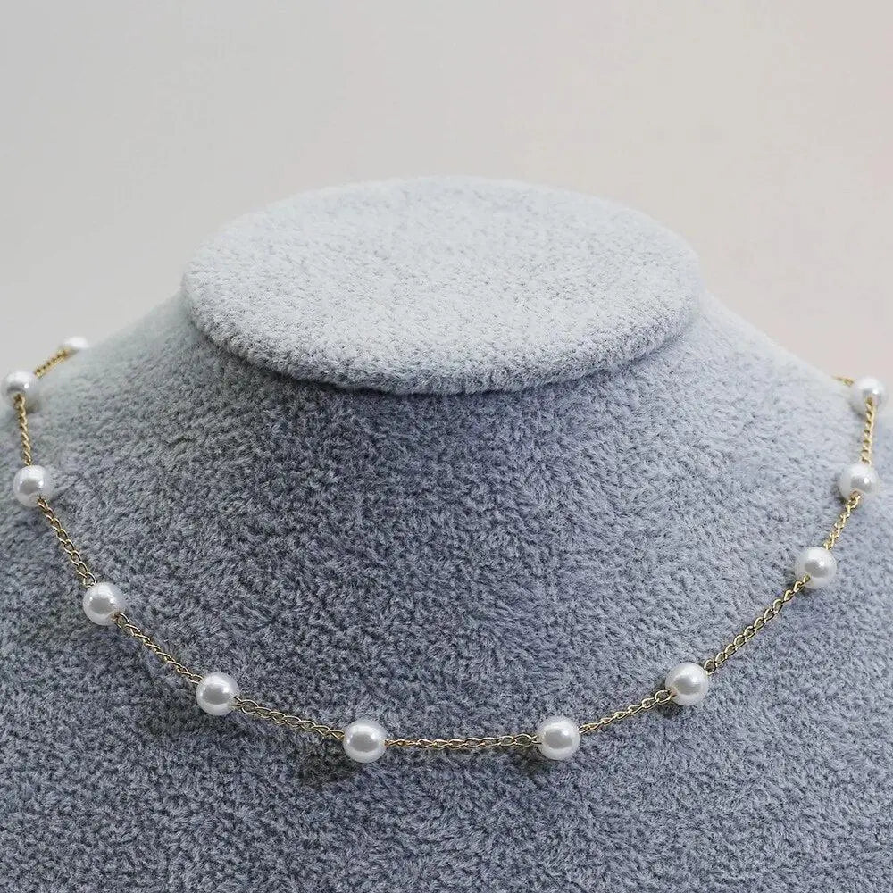 Gold spaced pearl chain necklace