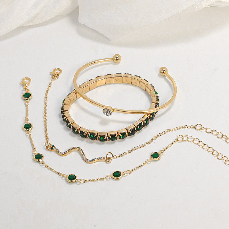 Gold emerald bracelet set