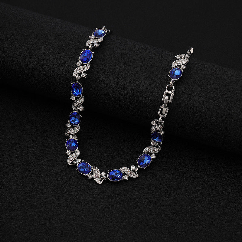 Silver sapphire floral link bracelet