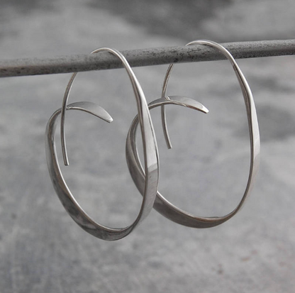 Pendientes de gran aro en espiral