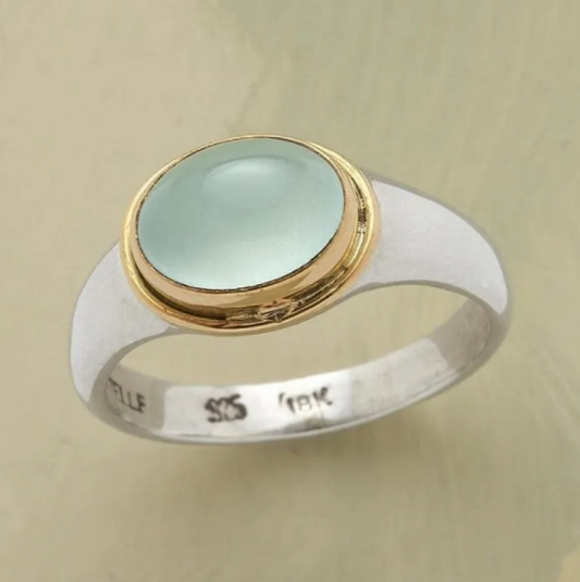 Anillo de plata con diamante verde