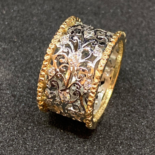 Silver and gold ornate band ring