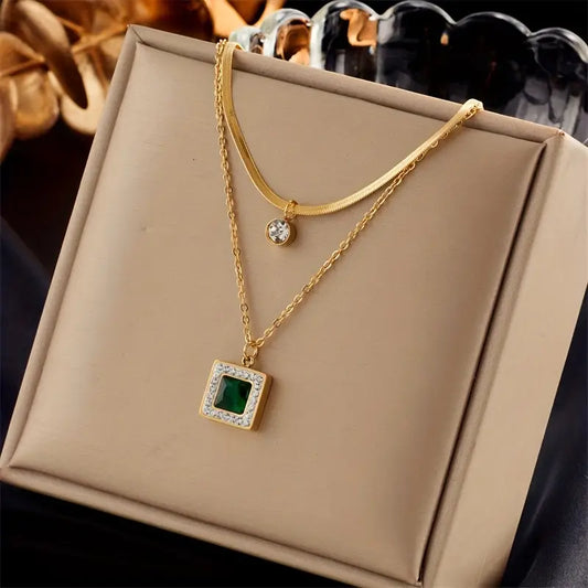 Gold emerald layered necklace