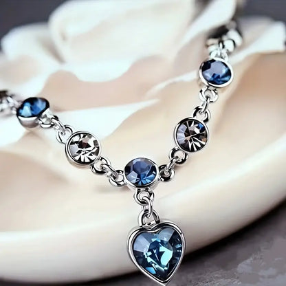 Silver sapphire heart chain bracelet