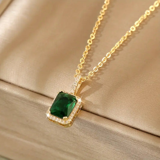 Gold emerald rectangular halo necklace