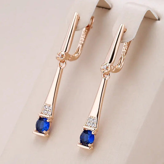 Pendientes colgantes con cristal azul en oro