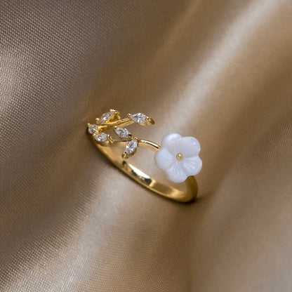 Gold floral and leaf open ring