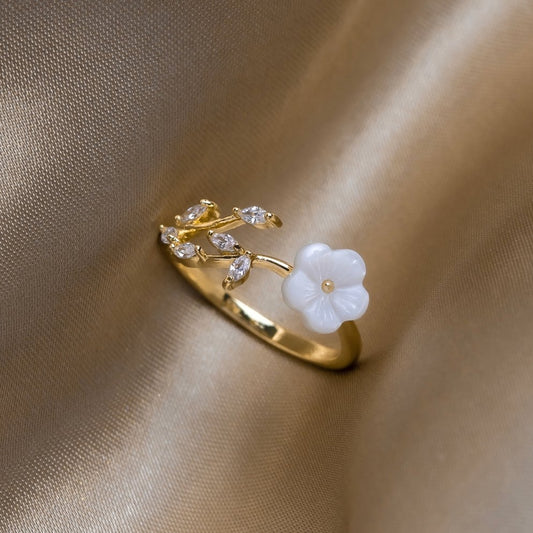 Gold floral and leaf open ring