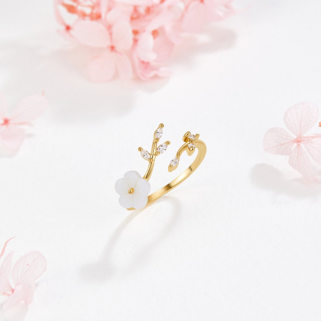 Gold floral and leaf open ring